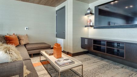 Resident Lounge with Couch Seating and Large Television