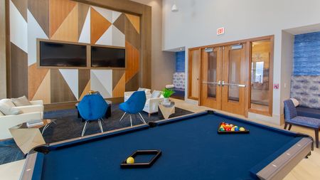 Resident's Lounge with Televisions and Pool Table