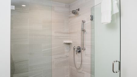 Glass Enclosed Shower with Tile Surrounds