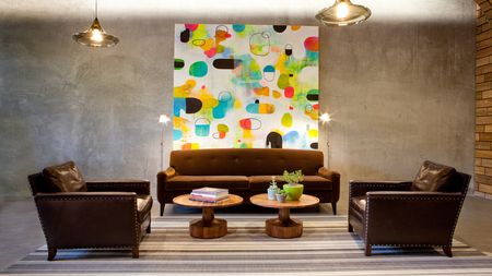 Customer lounge with brightly colored art feature