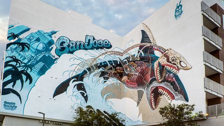 Exterior of building featuring wall art