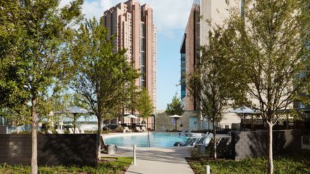 30,000 square foot Outdoor Pool Deck Featuring Cabana Lounges