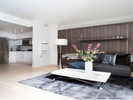 Open Concept Home with Large Living Room Open to Kitchen and Dining Area