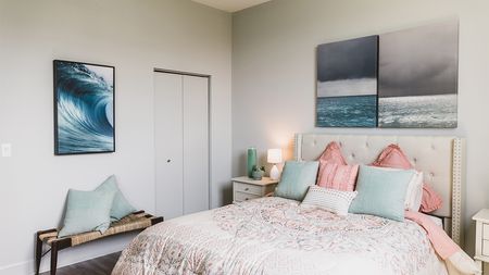 Bedroom with pink and aqua decor