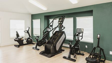 Stationary bikes and stair climber in the fitness center