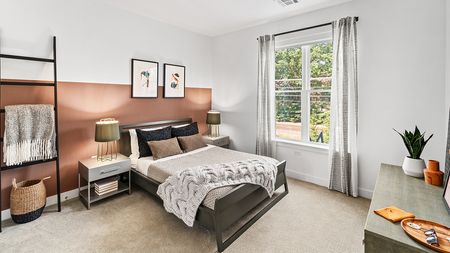 Large bedrooms with closets and carpeted bedrooms are featured in a Modera Framingham apartment.