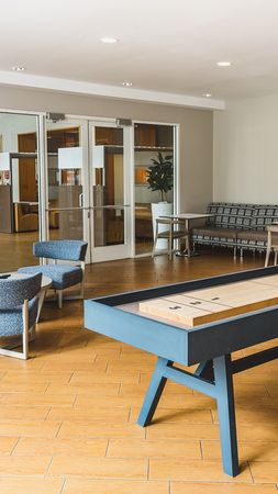 Shuffleboard table in resident lounge