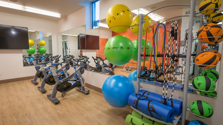 Gym with spin bikes and medicine balls