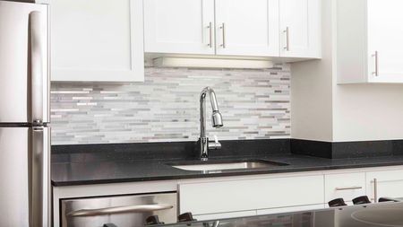 Contemporary Kitchen Faucet and Tile Backsplash