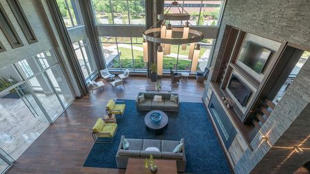 Resident Clubroom with Fireplace and Flat Screen Televisions