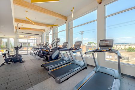 athletic center with high-end equipment at modera river north apartments in denver colorado