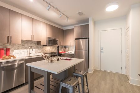 luxe kitchen with designer finishes at Modera Midtown apartment homes in atlanta georgia
