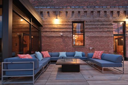 Outdoor Rooftop Lounge at Modera Lofts apartments.