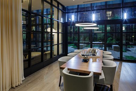 Private Meeting Room with Floor to Ceiling Windows and Seating for Eight