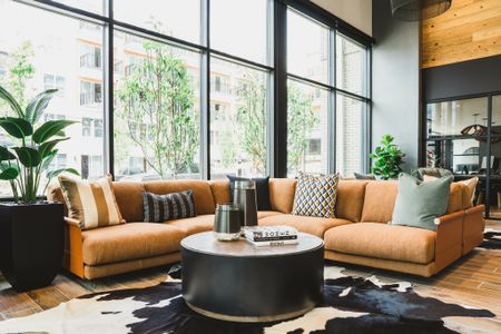 clubroom and lounge with ample seating at modera germantown apartment homes for rent in nashville tennessee