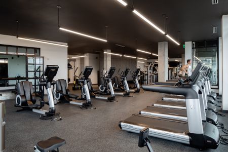 fitness center cardio equipment at modera art park apartment homes for rent in denver colorado