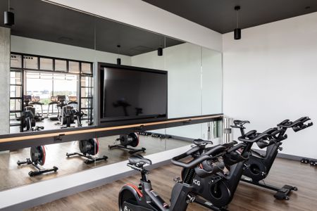 stationary bikes in gym at modera art park apartment homes for rent in denver colorado