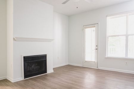 open floor plan with fireplace at alister lake lynn apartment homes for rent in raleigh north carolina