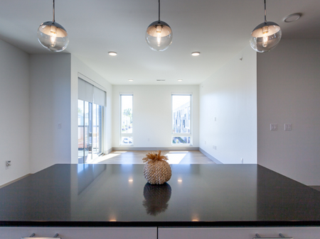 B7 Kitchen view over island into living area | 2501 Beacon Hill | Kansas City, MO Apartments