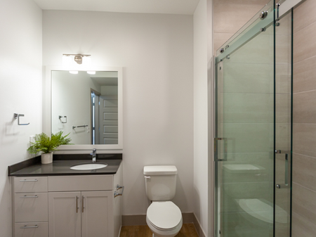 B7 Bathroom with glass shower doors | 2501 Beacon Hill | Kansas City, MO Apartments