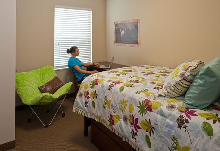 Resident studying in their Bedroom