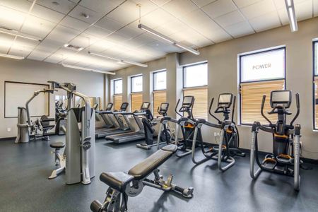 The fitness center at our apartments in Storrs, CT, featuring treadmills and other exercise machines.