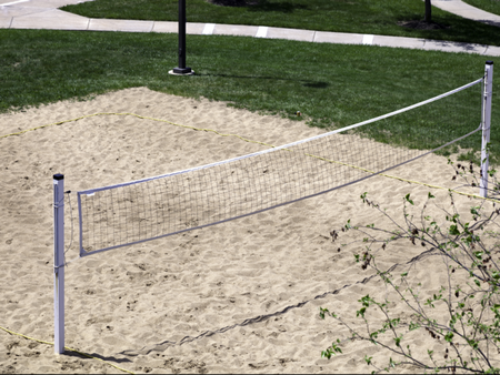 The net on the sand volleyball court at The Reserve on West 31st