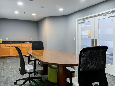 Study lounge with a large table and seating.