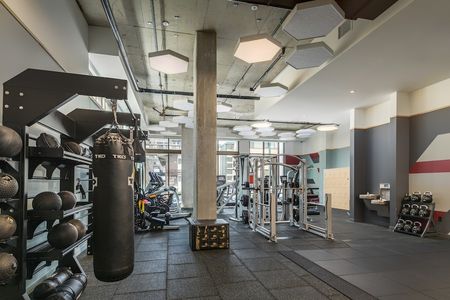 Fitness center with cardio equipment and various machines