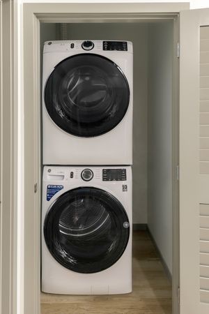 Stackable washer and dryer in every apartment
