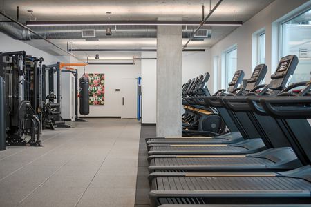 Fitness Center with treadmills, ellipticals, and various work out machines