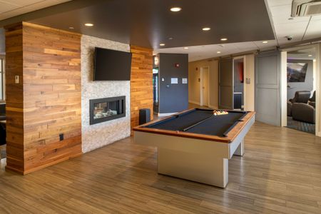 Game room with tv's and pool table