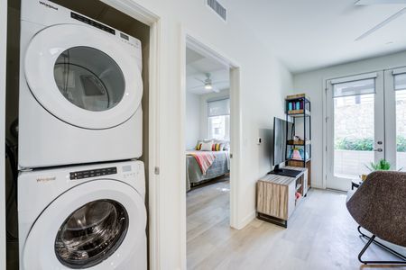 Model apartment laundry with a stackable washer & dryer
