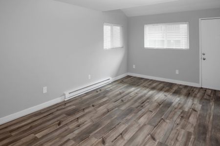 Renovated living room with hard surface floors