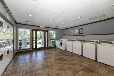 Community laundry center with apartments for rent in Acworth, GA.