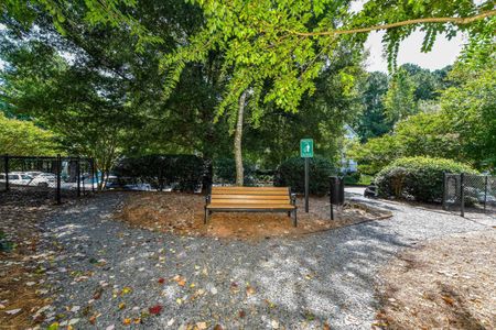 Outdoor community bench with apartments for rent in Acworth, GA.