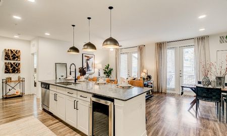Interior view of a luxury Grapevine apartment with a kitchen island.