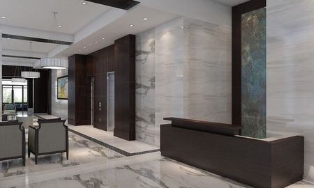 The hallways at our apartments in Arlington, featuring marble pattern walls and floor, and modern design.