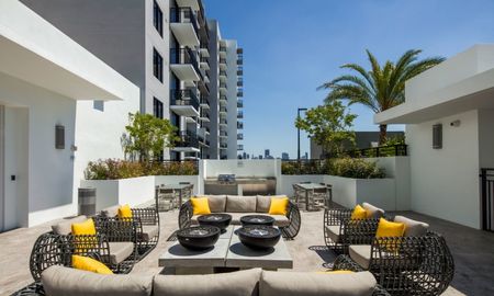 Balcony seating outside Miami apartments.