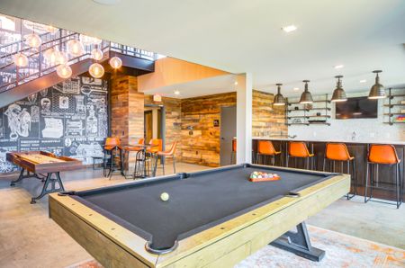 Entertainment room and resident lounge at our apartments in Washington DC, featuring a billiards table.