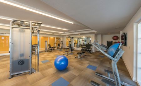 Fitness center at Caspian Delray Beach apartments.
