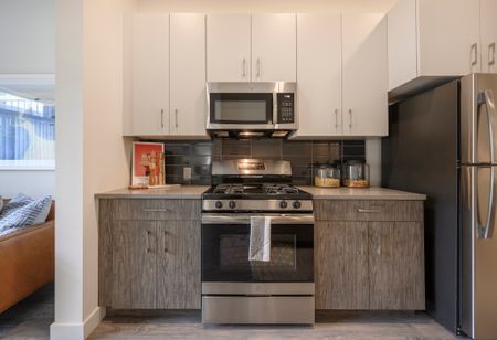 Modern kitchens w/ GE™ stainless-steel appliances