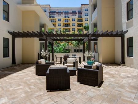 Outdoor patio beside luxury Boca Raton Florida apartments.