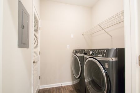 Laundry closet with washer and dryer