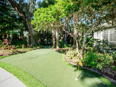 Outdoor mini-golf course with beautiful landscaping.
