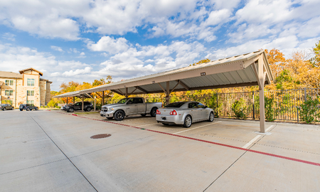 Covered parking spots available for residents of the preserve luxury apartments in Grapevine.