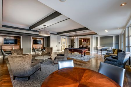 Resident Clubroom with Billiards, Lounge Area, and Flat Screen TVs