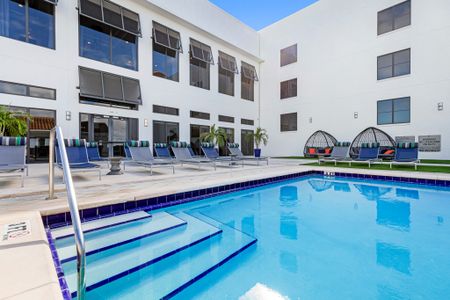 Resort style pool outside luxury Boca Raton apartments.