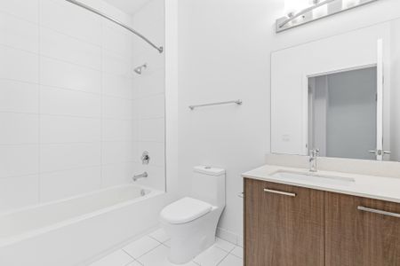 Bathroom photograph of living and lining area at townhome unit in Miami, FL.