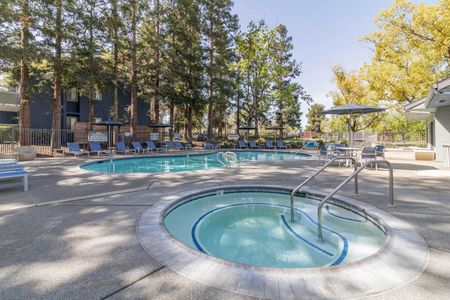 Avana Vista Point outdoor hot tub spa adjacent to main pool and seating